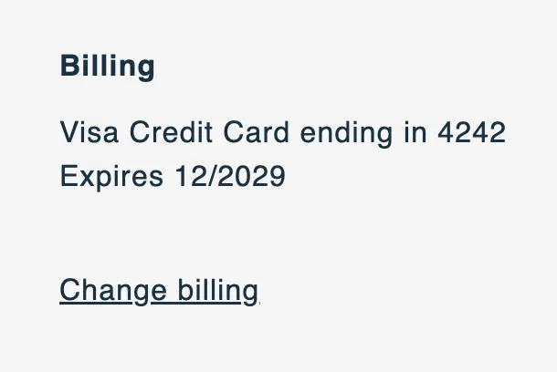 The Billing section of an order in the Subscription Manager, showing a Visa credit card's last four digits and expiry date, with an underlined Change billing link below.